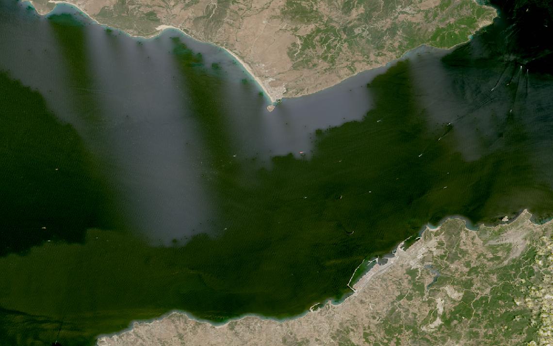 Landsat satellite image of the Strait of Gibraltar with vessel traffic between Spain and Morocco
