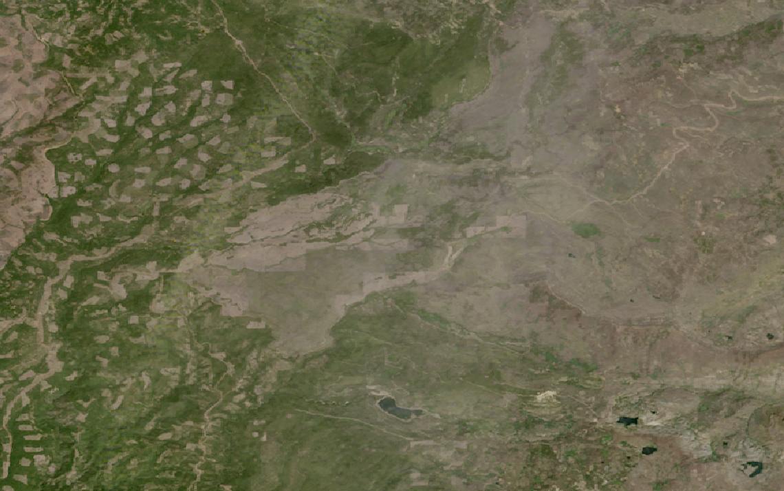 Landsat satellite image of a wildfire burn scar in the forests of the northern Sierra Nevada, California